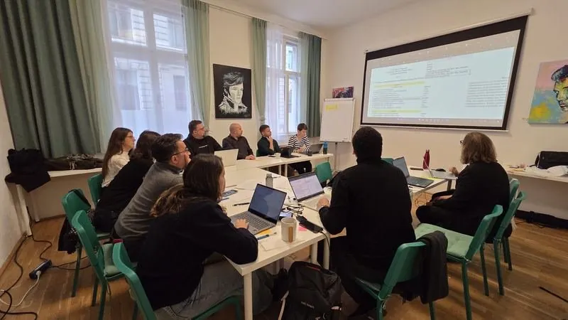 The partners discussing the structure of the Workbook