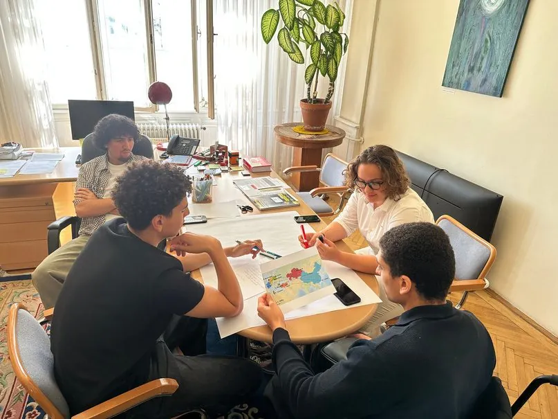 Young people working together at a table